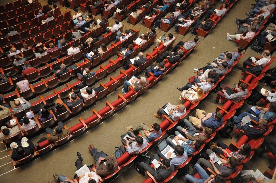 crowd seated in auditorium