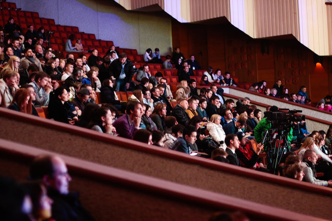 event attendees seated in amphitheater