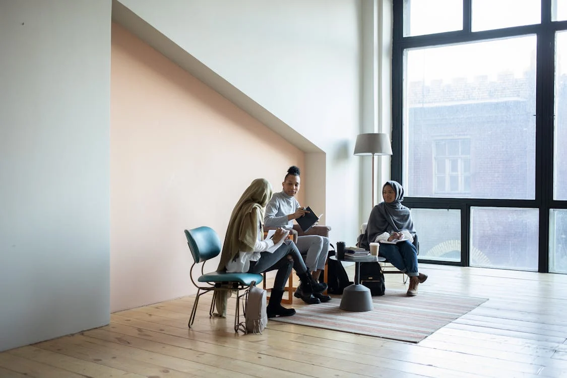 group of colleagues meeting to plan fundraising event