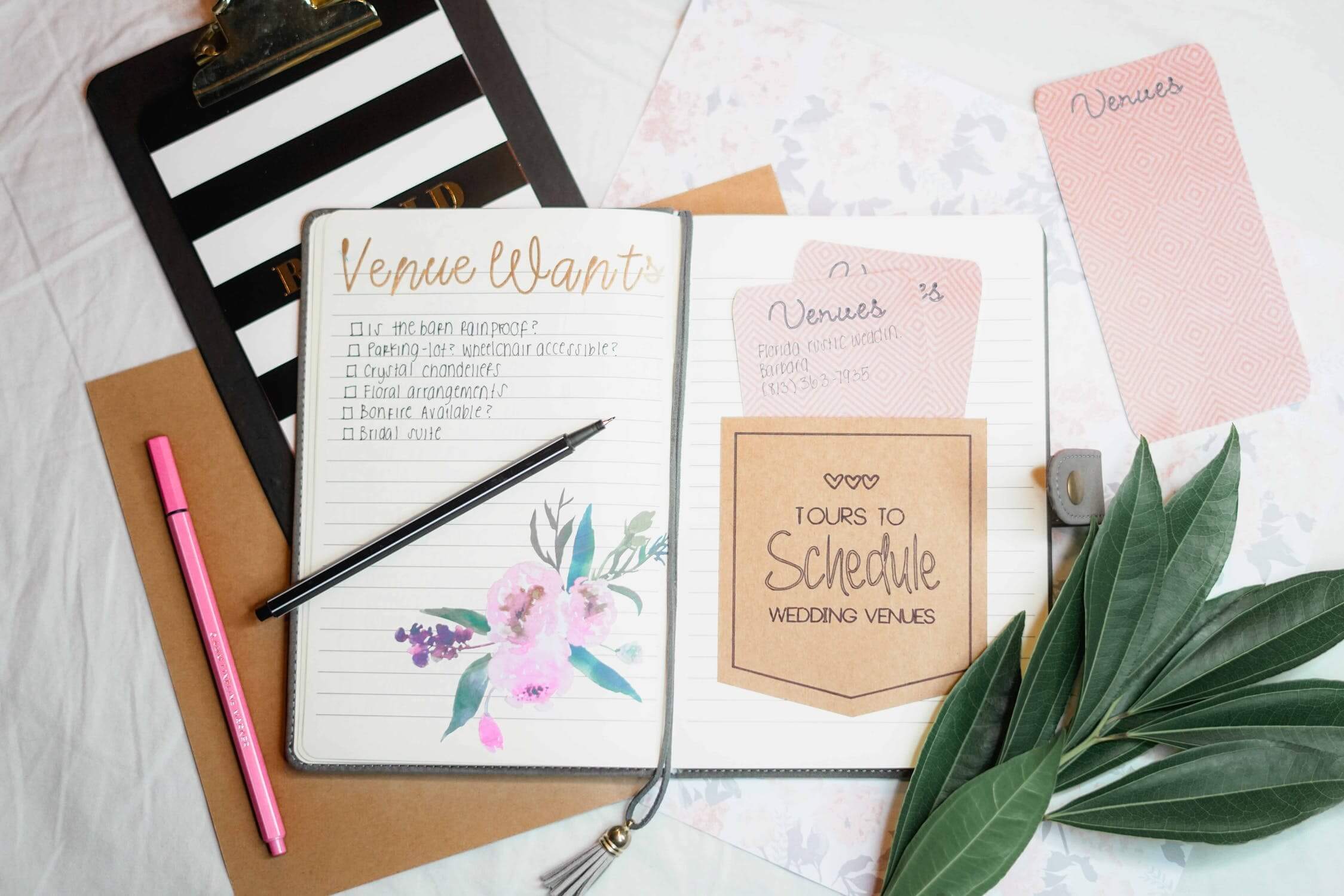 wedding planner notebook open on table
