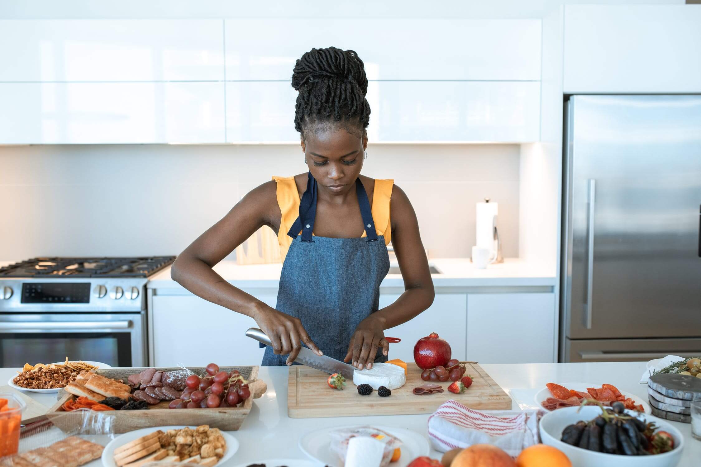 woman preparing food in kitchen