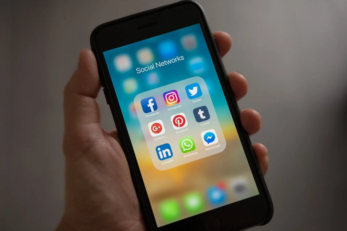 smartphone displaying social media folder