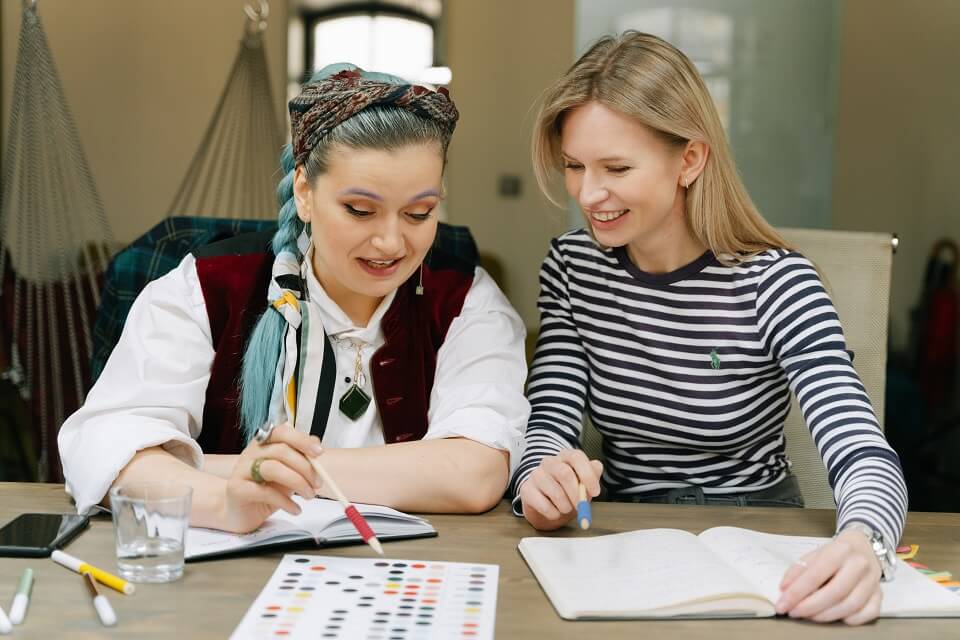 Two women planning and discussing